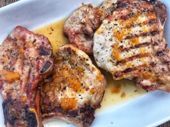 Juicy Grilled Pork Chops with Spicy Peach Sauce and Lubanzi